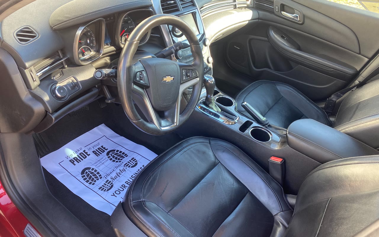 The Chevy Malibu's driver seat and dashboard